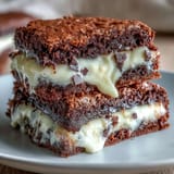 Cream Cheese Stuffed Brownie Mix Cookies: Decadent fudgy cookies with a creamy cheesecake center, baked to gooey perfection.