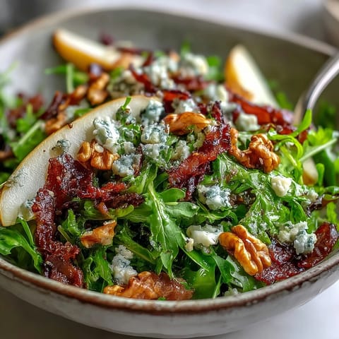 Frisée, Pear, Blue Cheese, Prosciutto Salad: vibrant greens, sweet pears, salty prosciutto.
